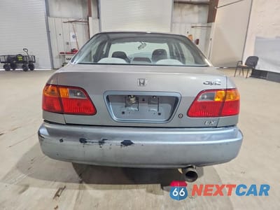 Zdjęcie 6 z 13 samochodu: 1999 HONDA CIVIC LX VIN:2HGEJ6677XH582180 - miniatura