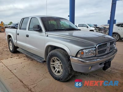 Czwarte zdjęcie samochodu z boku: 2003 DODGE DAKOTA QUAD SLT VIN:1D7HL48N43S133988 - miniatura