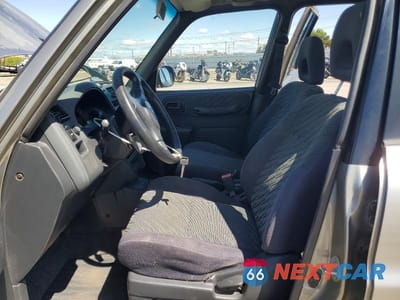 Zdjęcie 7 z 14 samochodu: 1999 TOYOTA RAV4 VIN:JT3HP10V2X7128567 - miniatura