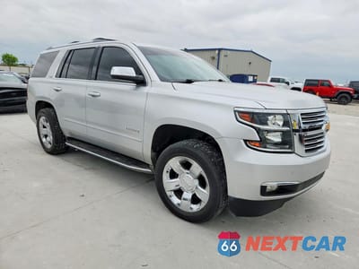 Czwarte zdjęcie samochodu z boku: 2015 CHEVROLET TAHOE K1500 LTZ VIN:1GNSKCKC1FR156460 - miniatura
