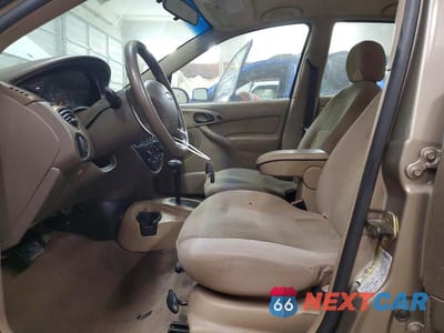 Zdjęcie 7 z 12 samochodu: 2004 FORD FOCUS SE COMFORT VIN:1FAFP34314W146542 - miniatura