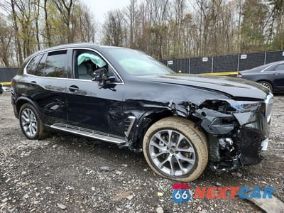 Czwarte zdjęcie samochodu z boku: 2026 BMW X5 XDRIVE40I VIN:5UX23EU08T9385801 - miniatura