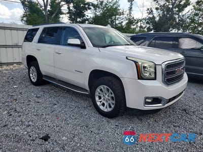 Czwarte zdjęcie samochodu z boku: 2016 GMC YUKON SLT VIN:1GKS1BKC9GR142852 - miniatura