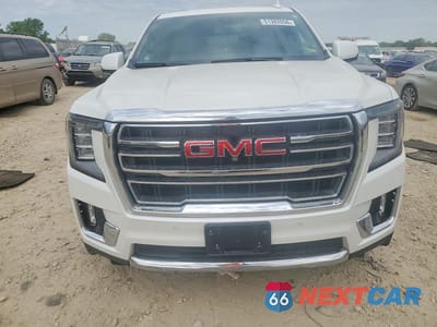 Piąte zdjęcie samochodu w środku: 2021 GMC YUKON SLT VIN:1GKS2BKD7MR138753 - miniatura