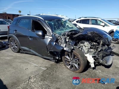 Czwarte zdjęcie samochodu z boku: 2018 MAZDA CX-3 TOURING VIN:JM1DKDC75J0313915 - miniatura