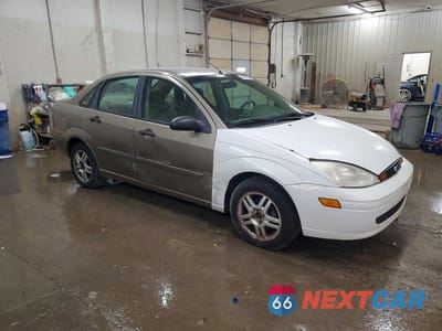 Czwarte zdjęcie samochodu z boku: 2004 FORD FOCUS SE COMFORT VIN:1FAFP34314W146542 - miniatura