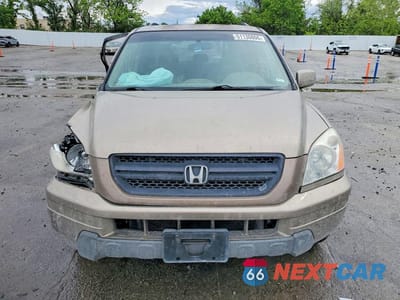 Piąte zdjęcie samochodu w środku: 2004 HONDA PILOT EXL VIN:2HKYF18634H535591 - miniatura