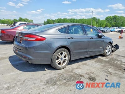 Trzecie zdjęcie samochodu z tyłu: 2018 FORD FUSION SE HYBRID VIN:3FA6P0LU6JR235269 - miniatura