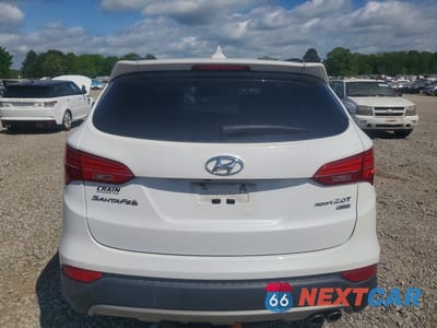 Zdjęcie 6 z 13 samochodu: 2014 HYUNDAI SANTA FE SPORT 2.0T VIN:5XYZWDLA8EG145242 - miniatura