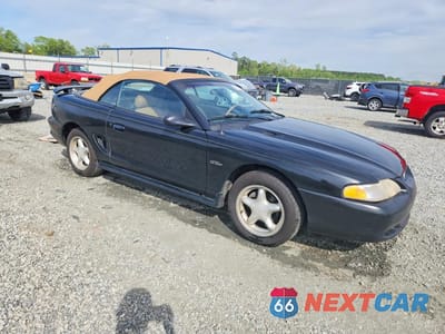 Czwarte zdjęcie samochodu z boku: 1996 FORD MUSTANG GT VIN:1FALP45X7TF180669 - miniatura