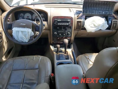 Zdjęcie 8 z 13 samochodu: 2001 JEEP GRAND CHEROKEE VIN:1J4GW58S91C696156 - miniatura