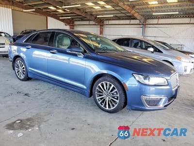 Czwarte zdjęcie samochodu z boku: 2018 LINCOLN MKZ HYBRID SELECT VIN:3LN6L5LU7JR619592 - miniatura