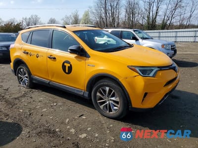 Czwarte zdjęcie samochodu z boku: 2017 TOYOTA RAV4 HYBRID LE PLUS VIN:JTMRJREVXHD073426 - miniatura