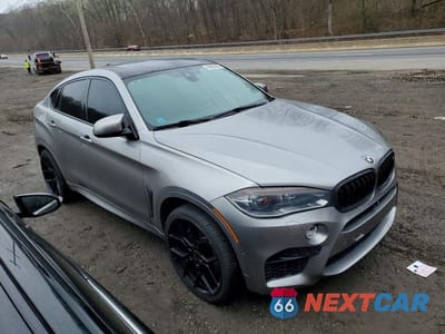 Czwarte zdjęcie samochodu z boku: 2015 BMW X6 M VIN:5YMKW8C52F0R42824 - miniatura