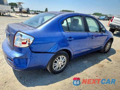 Trzecie zdjęcie samochodu z tyłu: 2013 SUZUKI SX4 LE VIN:JS2YC5A35D6100359 - miniatura