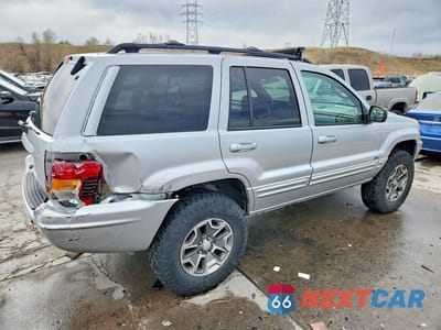 Trzecie zdjęcie samochodu z tyłu: 2003 JEEP GRAND CHEROKEE LIMITED VIN:1J4GW58J83C568582 - miniatura