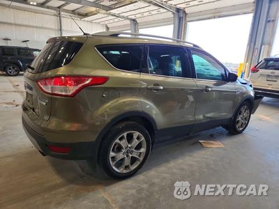 Trzecie zdjęcie samochodu z tyłu: 2014 FORD ESCAPE TITANIUM VIN:1FMCU0JX1EUA82443 - miniatura