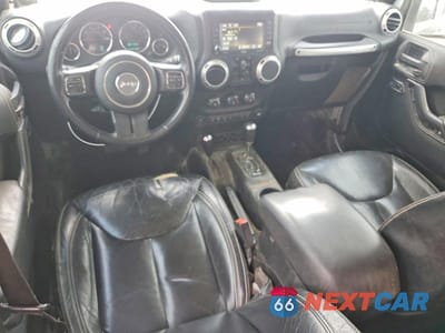 Zdjęcie 8 z 13 samochodu: 2014 JEEP WRANGLER UNLIMITED SAHARA VIN:1C4BJWEG7EL296431 - miniatura