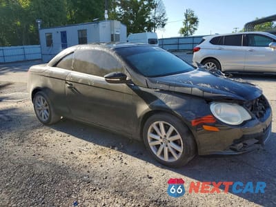 Czwarte zdjęcie samochodu z boku: 2011 VOLKSWAGEN EOS KOMFORT VIN:WVWBA7AH2BV001983 - miniatura