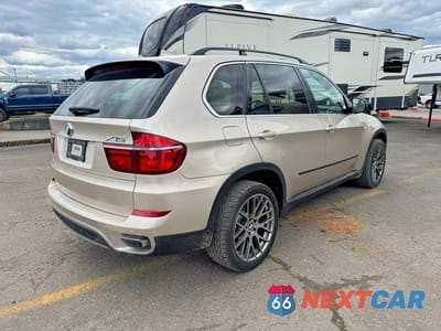 Czwarte zdjęcie samochodu z boku: 2013 BMW X5 XDRIVE50I VIN:5UXZV8C52DL426841 - miniatura