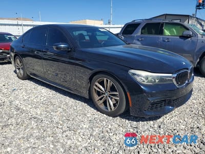 Czwarte zdjęcie samochodu z boku: 2016 BMW 740 VIN:WBA7E2C53GG547894 - miniatura