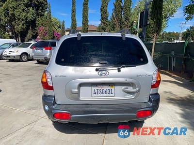 Zdjęcie 11 z 14 samochodu: 2001 HYUNDAI SANTA FE GL VIN:KM8SC83D01U126863 - miniatura