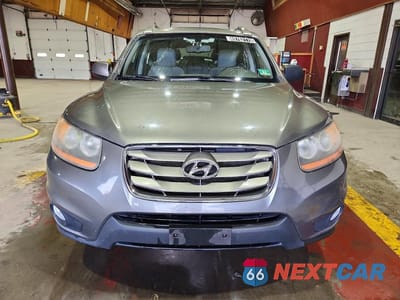 Piąte zdjęcie samochodu w środku: 2011 HYUNDAI SANTA FE SE VIN:5XYZHDAGXBG031823 - miniatura
