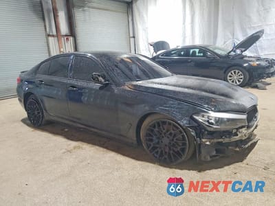Czwarte zdjęcie samochodu z boku: 2018 BMW 530 XI VIN:WBAJA7C52JWA73063 - miniatura