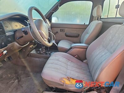 Zdjęcie 7 z 12 samochodu: 2000 TOYOTA TACOMA BASE VIN:4TAPM62N2YZ591370 - miniatura