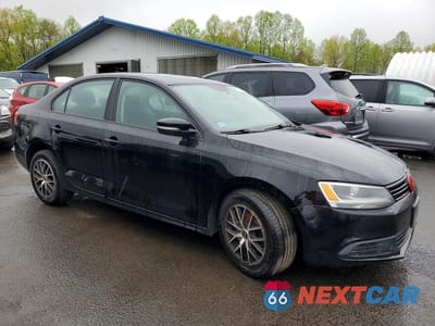 Czwarte zdjęcie samochodu z boku: 2014 VOLKSWAGEN JETTA SE VIN:3VWD17AJ9EM377524 - miniatura