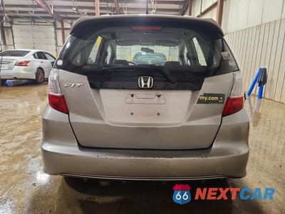 Zdjęcie 6 z 13 samochodu: 2009 HONDA FIT SPORT VIN:JHMGE88489S054975 - miniatura