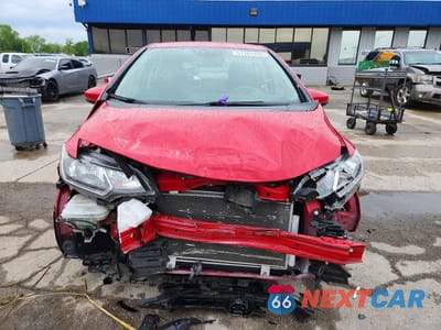 Piąte zdjęcie samochodu w środku: 2016 HONDA FIT LX VIN:JHMGK5H51GX006881 - miniatura