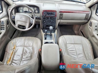 Zdjęcie 8 z 14 samochodu: 2003 JEEP GRAND CHEROKEE LIMITED VIN:1J4GW58J83C568582 - miniatura