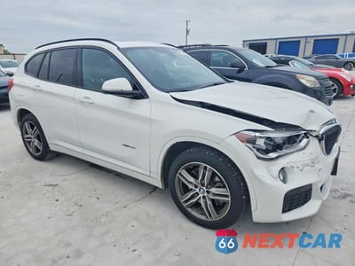 Czwarte zdjęcie samochodu z boku: 2018 BMW X1 SDRIVE28I VIN:WBXHU7C32J5H42660 - miniatura