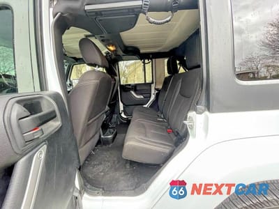 Zdjęcie 12 z 12 samochodu: 2015 JEEP WRANGLER UNLIMITED SAHARA VIN:1C4BJWEGXFL540381 - miniatura