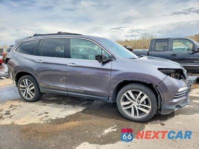 Czwarte zdjęcie samochodu z boku: 2018 HONDA PILOT TOURING VIN:5FNYF6H96JB048337 - miniatura