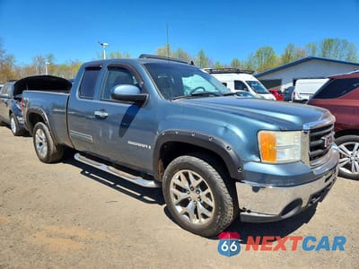 Czwarte zdjęcie samochodu z boku: 2009 GMC SIERRA K1500 SLT VIN:1GTEK390X9Z258930 - miniatura