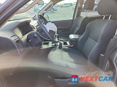 Zdjęcie 7 z 13 samochodu: 2004 JEEP GRAND CHEROKEE LAREDO VIN:1J4GW48S64C263621 - miniatura