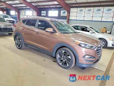 Czwarte zdjęcie samochodu z boku: 2016 HYUNDAI TUCSON SPORT VIN:KM8J3CA27GU232946 - miniatura