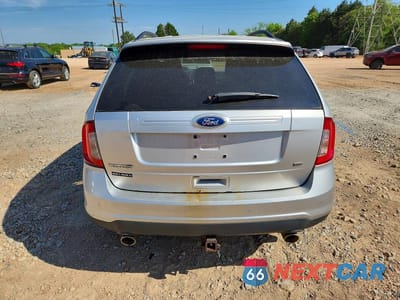 Zdjęcie 6 z 12 samochodu: 2012 FORD EDGE SEL VIN:2FMDK4JC8CBA39087 - miniatura