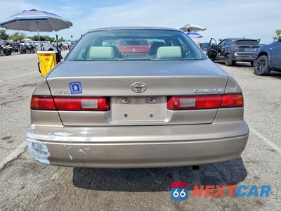 Zdjęcie 6 z 12 samochodu: 1999 TOYOTA CAMRY LE VIN:4T1BG22K9XU864364 - miniatura