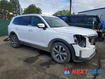 Czwarte zdjęcie samochodu z boku: 2022 KIA TELLURIDE S VIN:5XYP6DHC7NG285803 - miniatura