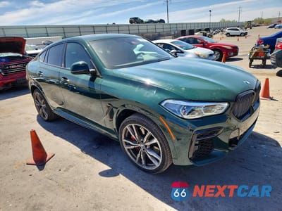 Czwarte zdjęcie samochodu z boku: 2022 BMW X6 M50I VIN:5UXCY8C01N9K59887 - miniatura
