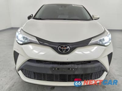 Piąte zdjęcie samochodu w środku: 2021 TOYOTA C-HR LE VIN:JTNKHMBX3M1105954 - miniatura