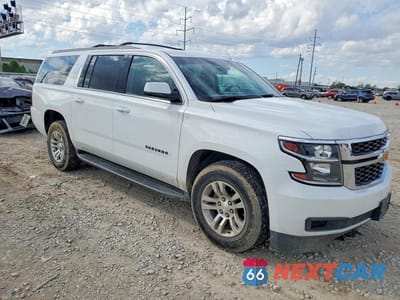 Czwarte zdjęcie samochodu z boku: 2017 CHEVROLET SUBURBAN C1500 LS VIN:1GNSCGEC7HR341034 - miniatura