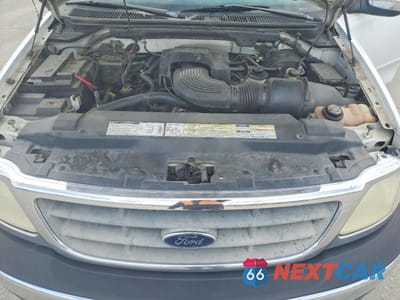 Zdjęcie 11 z 12 samochodu: 2000 FORD F150 VIN:1FTRX17L1YKA73161 - miniatura