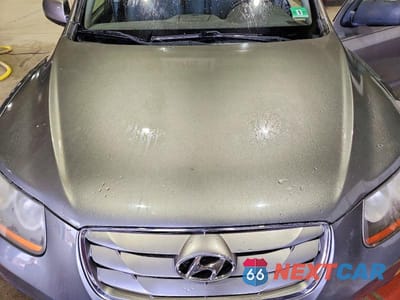 Zdjęcie 12 z 13 samochodu: 2011 HYUNDAI SANTA FE SE VIN:5XYZHDAGXBG031823 - miniatura