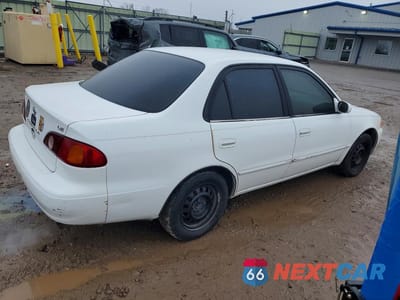Trzecie zdjęcie samochodu z tyłu: 2002 TOYOTA COROLLA LE VIN:1NXBR12E12Z593632 - miniatura