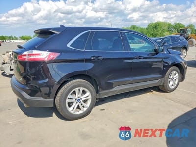 Trzecie zdjęcie samochodu z tyłu: 2019 FORD EDGE VIN:2FMPK3J97KBC33698 - miniatura