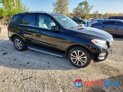 Czwarte zdjęcie samochodu z boku: 2016 MERCEDES-BENZ GLE 350 4MATIC VIN:4JGDA5HB0GA721713 - miniatura